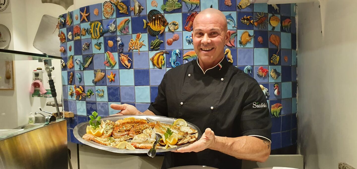 Chef presenting seafood platter